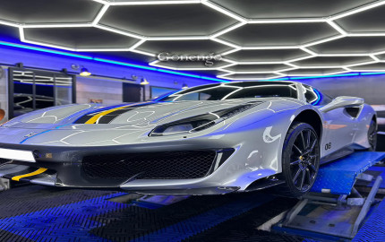 How does lighting impact the experience for consumers in auto showroom?