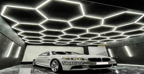 What challenges do car detailers face if they don't have adequate lighting in their workshop?