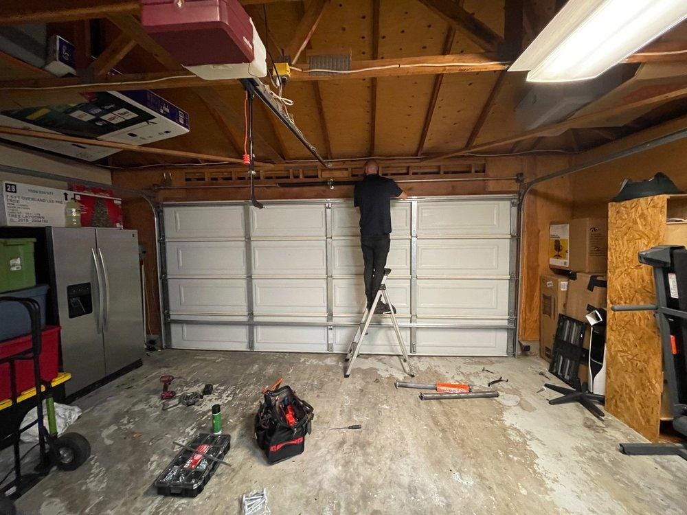 Expert Broken Garage Door Spring Repair Services by Simo Garage Door LLC
