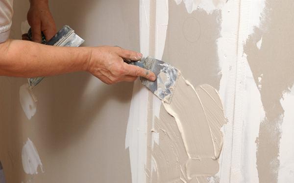 Can Professional Painters Repair Wall Damages Before Painting?