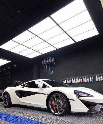 Why LED lights be preferred for showcasing finished results to customers in car shops?