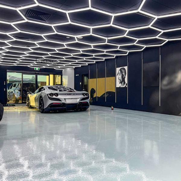 How do adjustable LED lights assist in ensuring that the car is thoroughly cleaned?