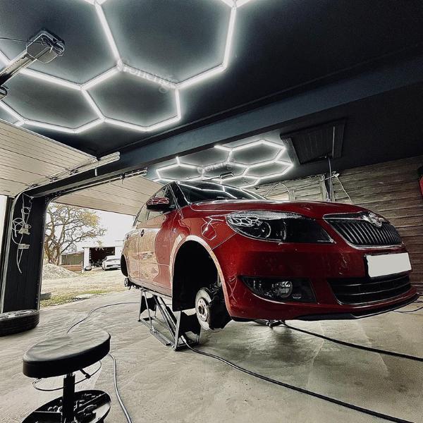 How can dimmable LED lights help identify imperfections on vehicle surfaces?