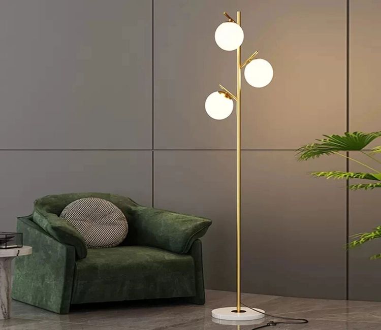 How can floor lamps enhance my living room ambiance?