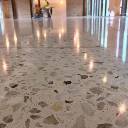 What Are the Best Techniques to Achieve High-Quality Polished Exterior Concrete Finishes?
