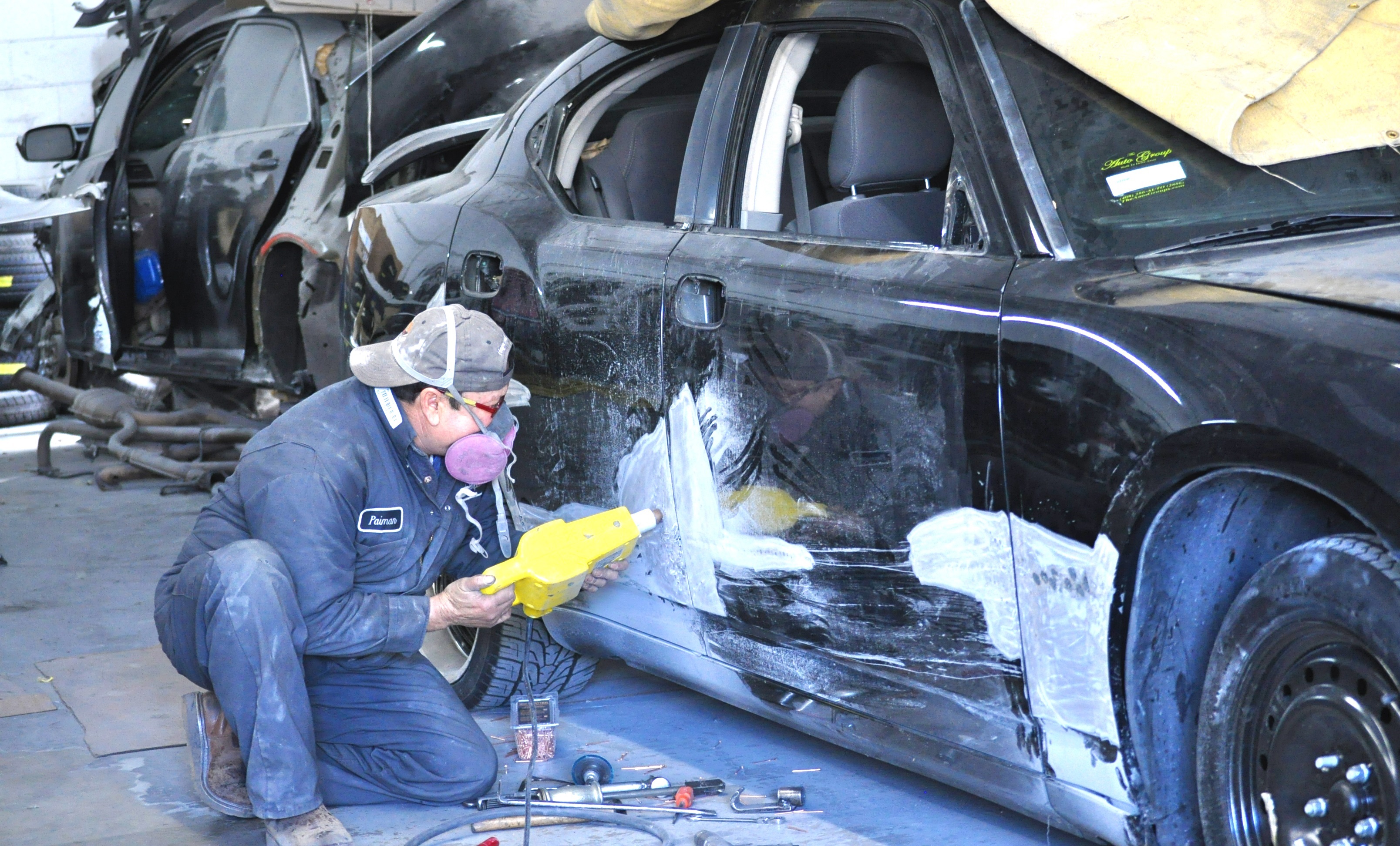 How Do Auto Body Repair Experts Restore A Car After An Accident?