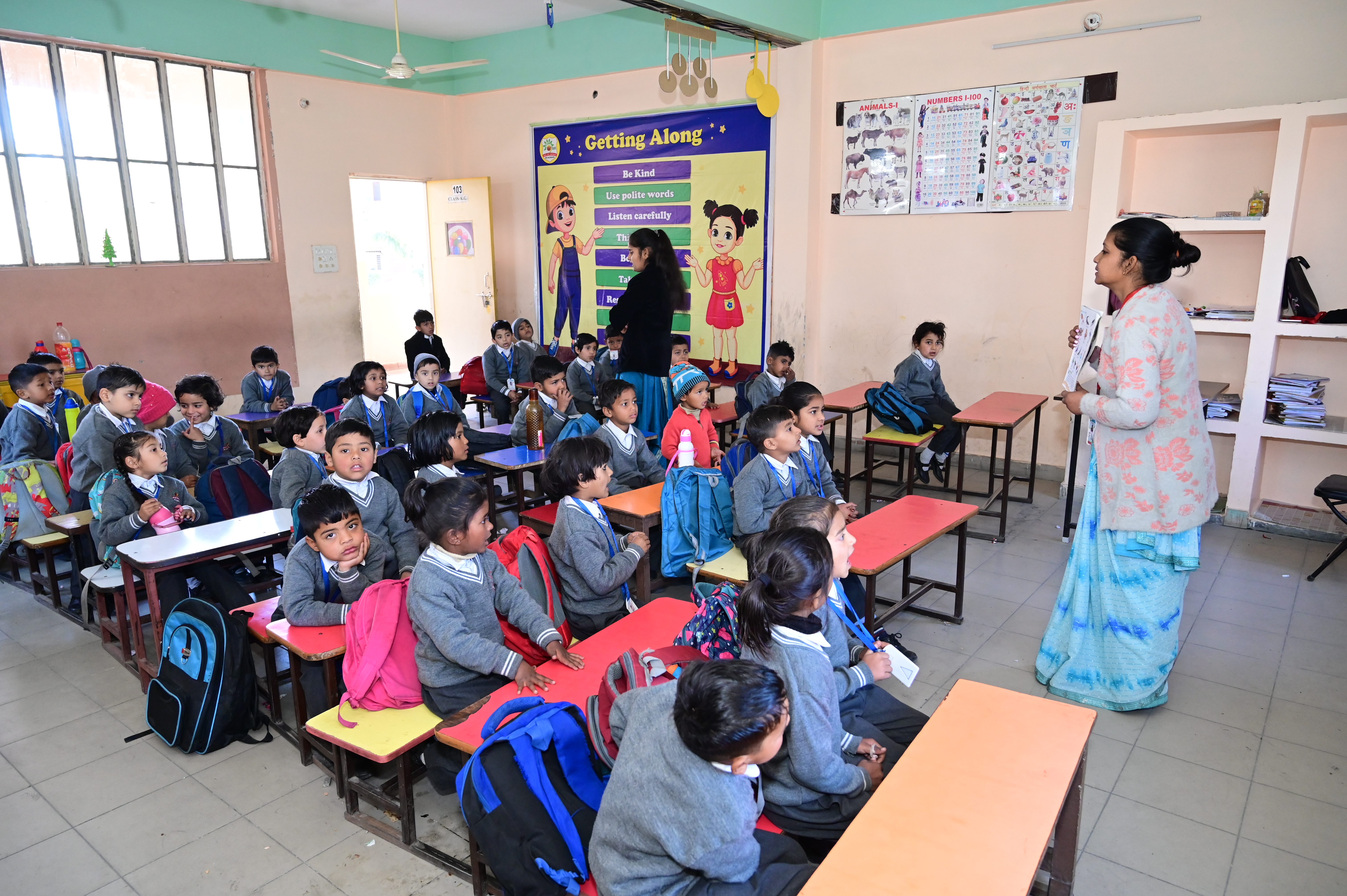 How do day boarding schools in Dehradun support students' extracurricular interests?