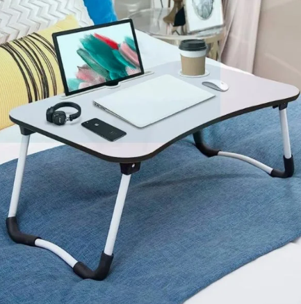 What makes the METALLO Wooden Gaming Laptop Table a must-have for avid gamers?