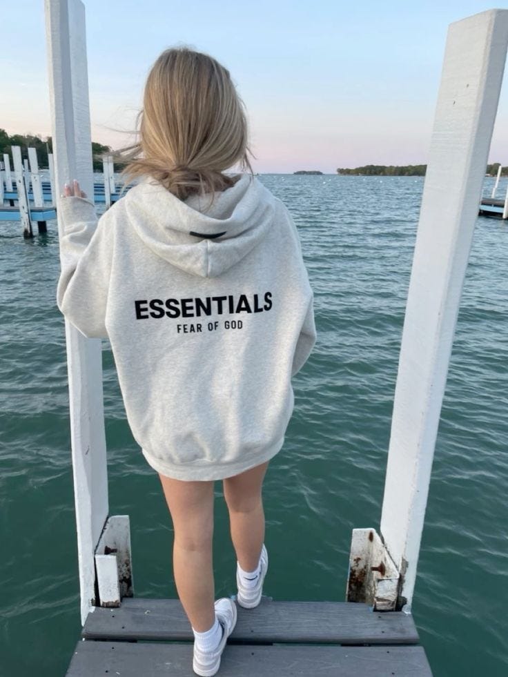Essentials Hoodie Minimalistic Branding: Understated Designs for Everyday Wear