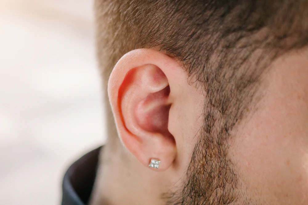 DIY vs Professional: Getting an Ear Piercing for Men Safely