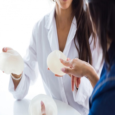 What factors influence the cost of breast augmentation?