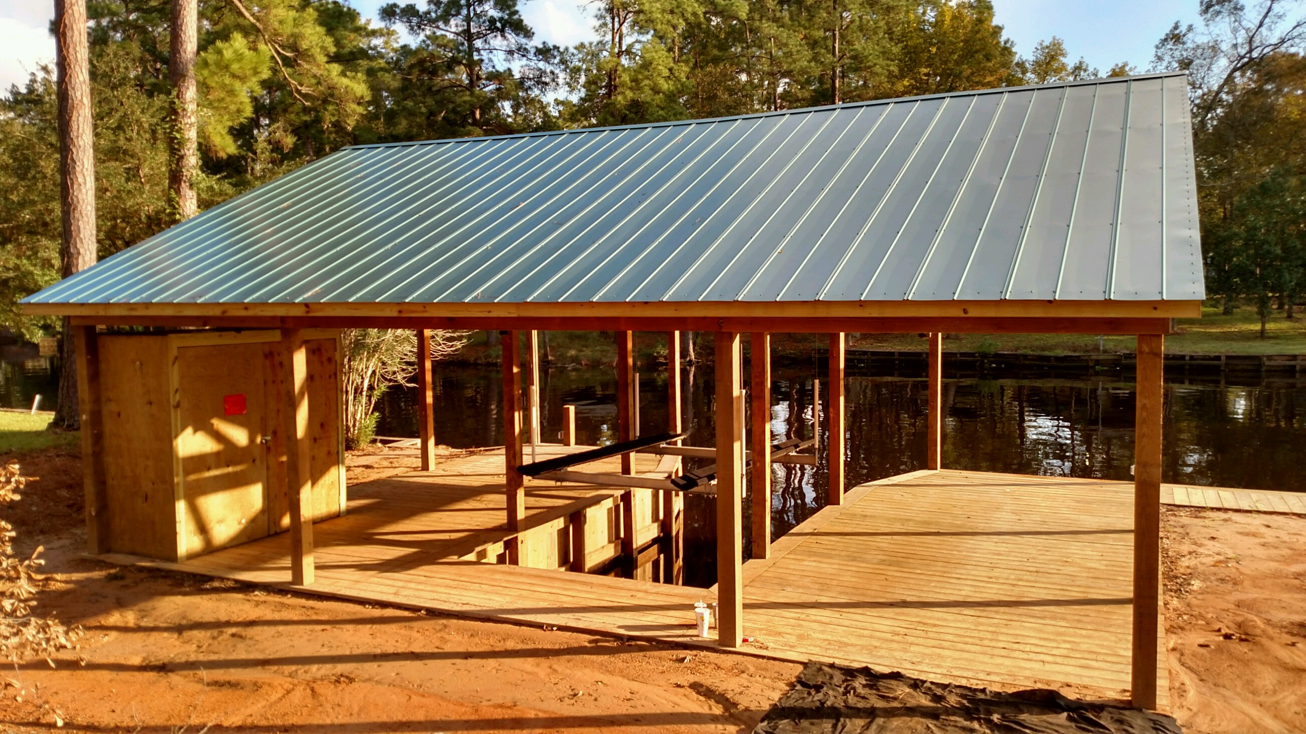 The Benefits of Working with a Local Boat House Builder