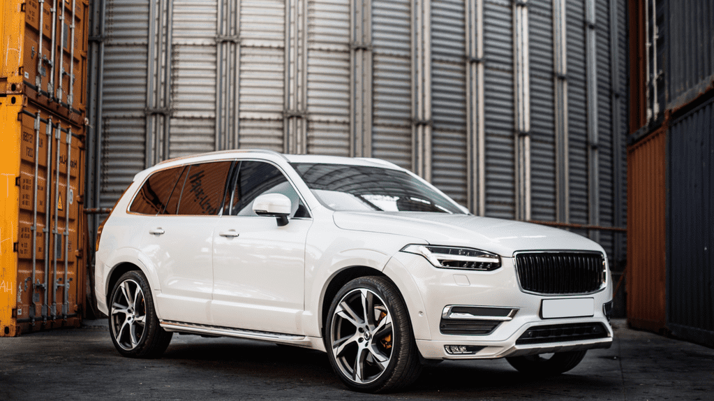 How does a pre-owned luxury vehicle hold its value over time?