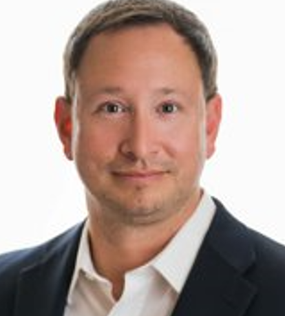 From Northern New Mexico Streets to Economic Development: The Changing Life of Jason Everett Grinage