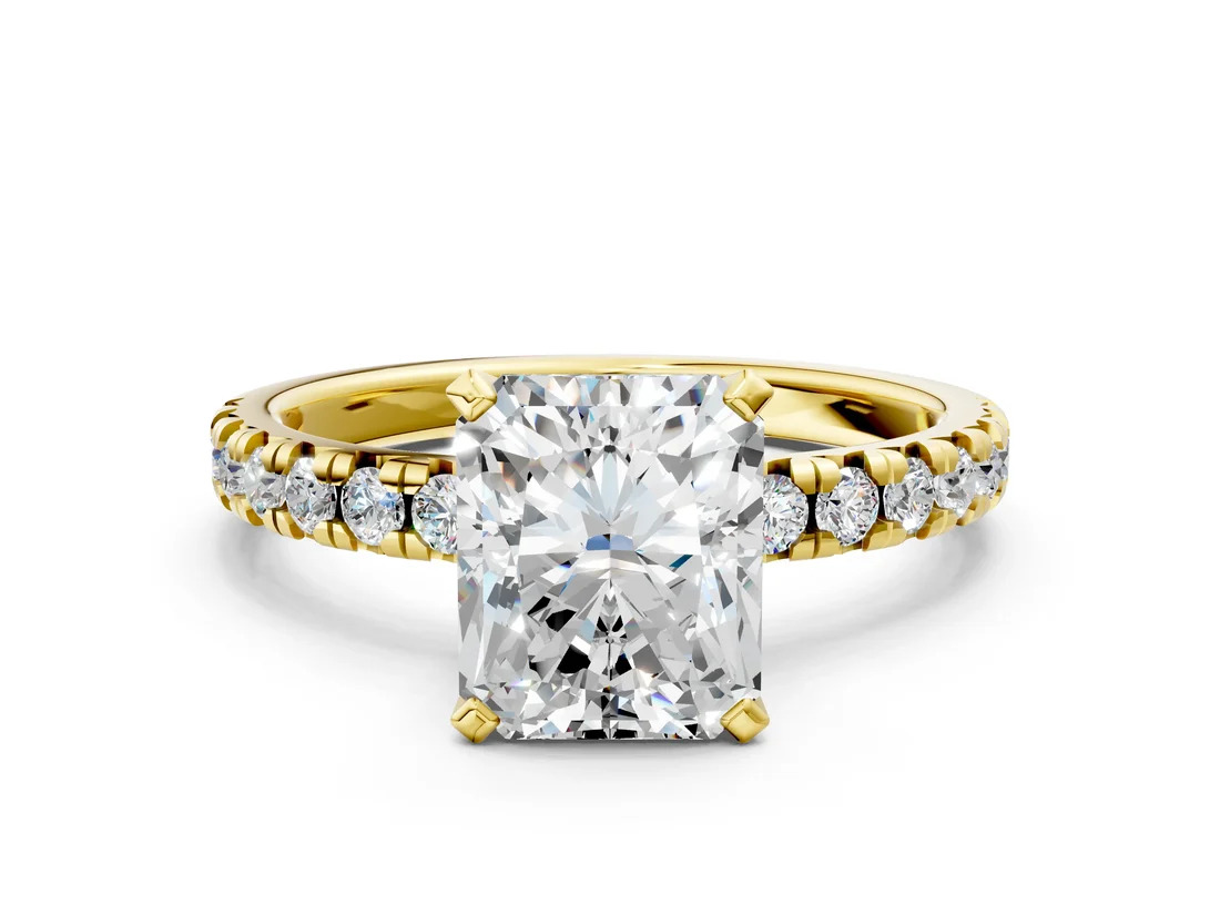 Yellow Gold Radiant Cut Diamond Solitaire Pavé Engagement Ring with Round Band and Prong Setting: Sparkle That Follows E